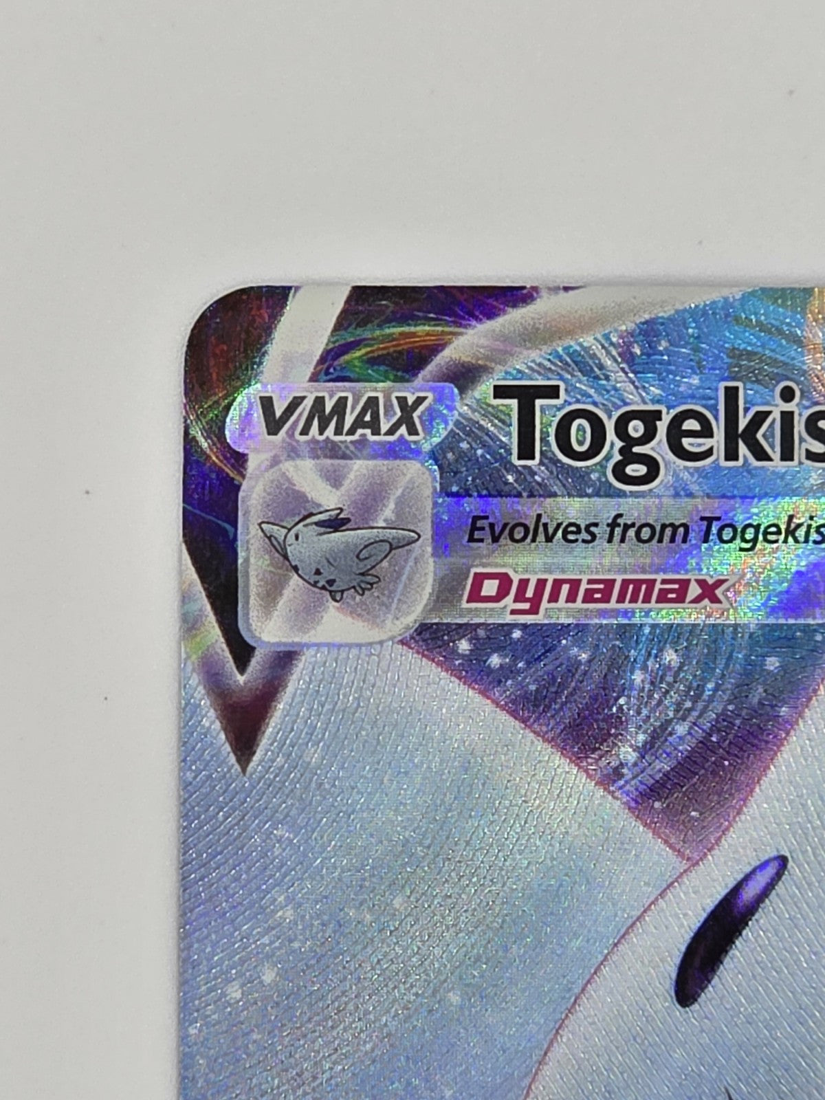 Togekiss VMAX 141/185 Swsh04: Vivid Voltage Holo NM