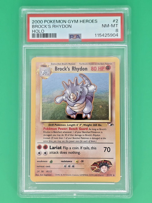 PSA 8 Brock's Rhydon 002/132 Gym Heroes Holo